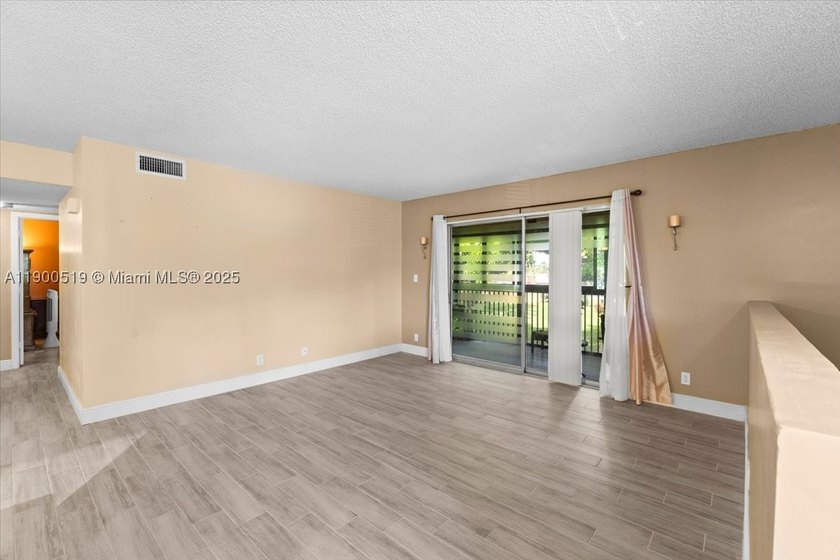 Welcome to this beautifully upgraded corner unit condo in the - photo 9