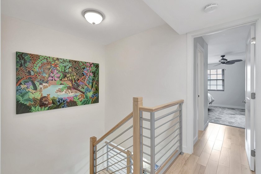 Envision residing just steps away from the serene beachfront of - photo 6