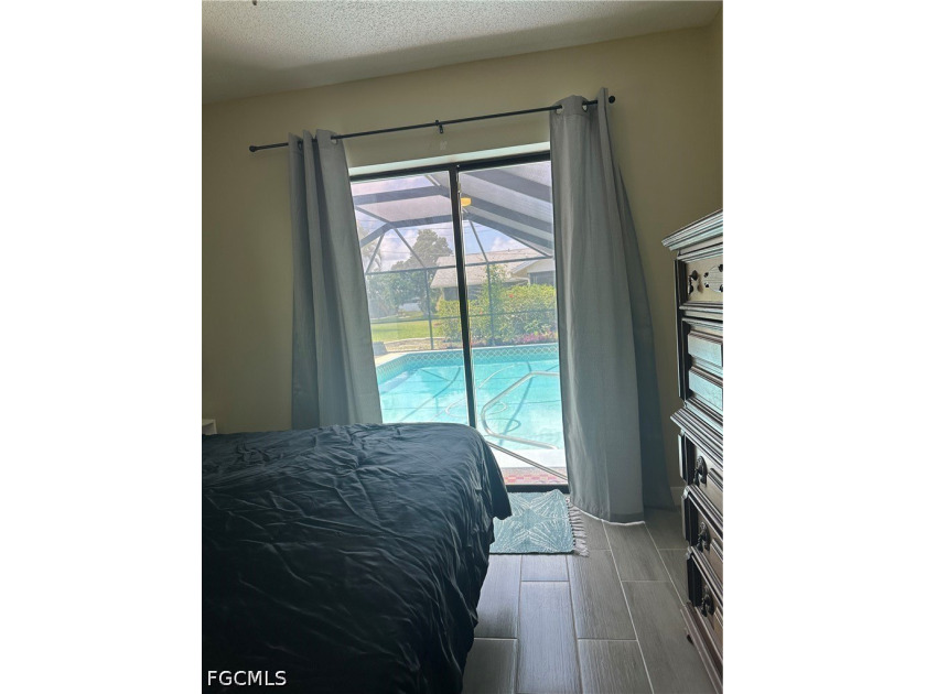 This 3/2 house with open floor plan, heated pool, large back - photo 11