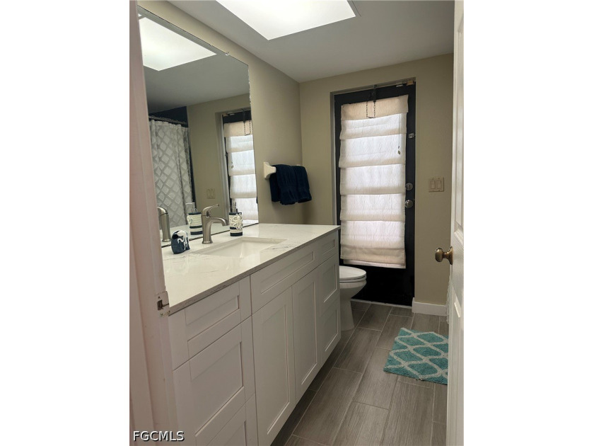 This 3/2 house with open floor plan, heated pool, large back - photo 13