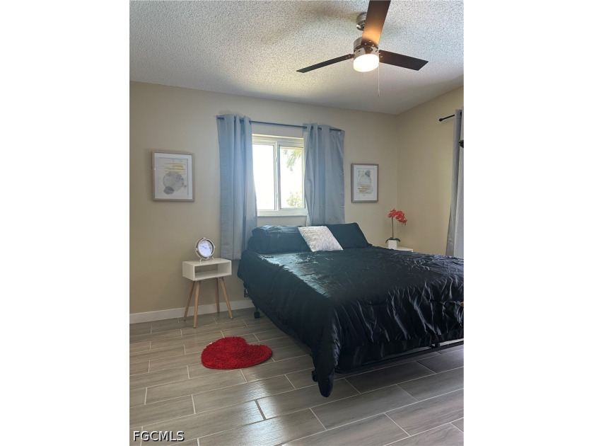 This 3/2 house with open floor plan, heated pool, large back - photo 14