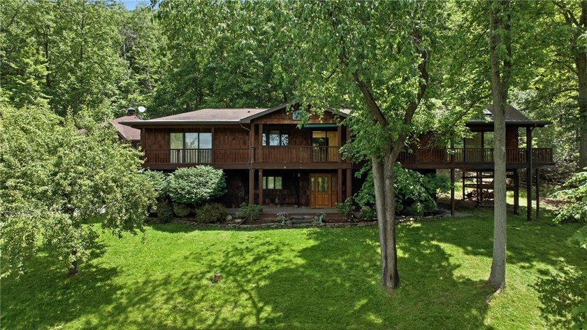 Quintessential West Bluff Drive on Keuka Lake. Nestled among the - photo 2