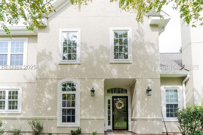 This stunning, end-unit townhome features a grand two-story - photo 2