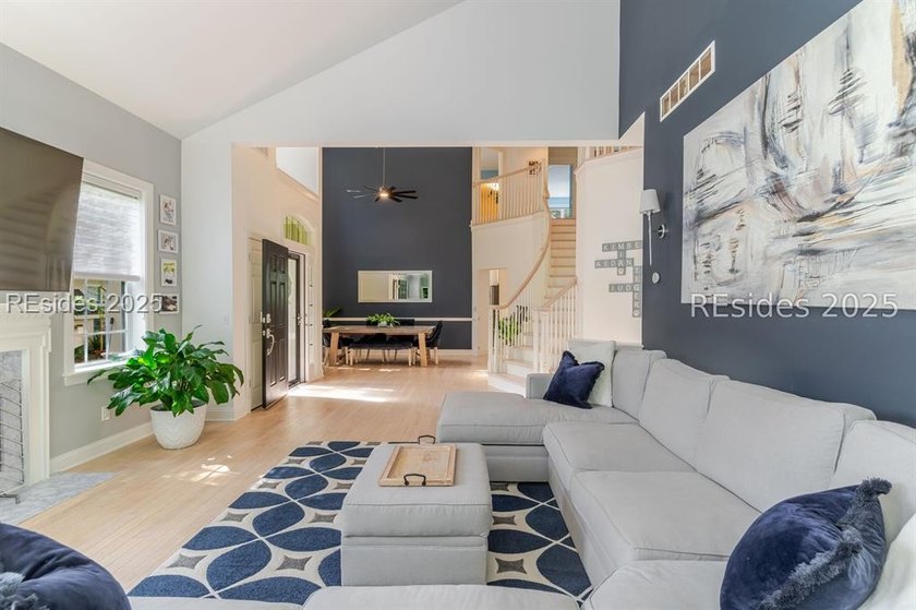 This stunning, end-unit townhome features a grand two-story - photo 8
