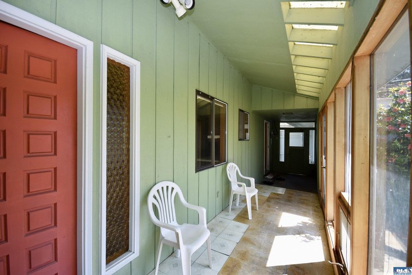 Rare, stunning waterfront property ready for your remodel - photo 10