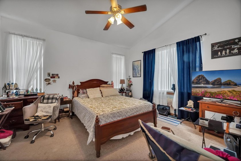 Nestled in the desirable gated community of Magnolia Lakes in - photo 14