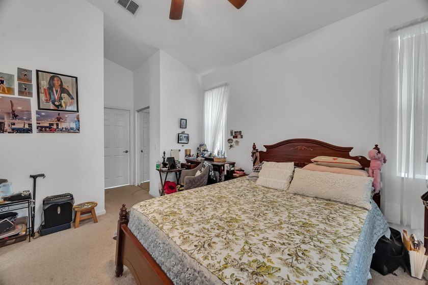 Nestled in the desirable gated community of Magnolia Lakes in - photo 15