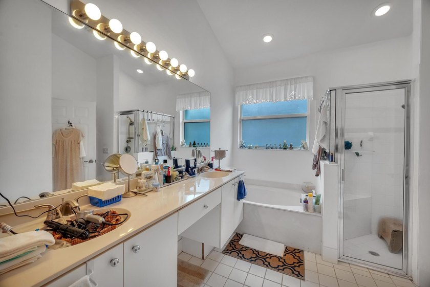 Nestled in the desirable gated community of Magnolia Lakes in - photo 16