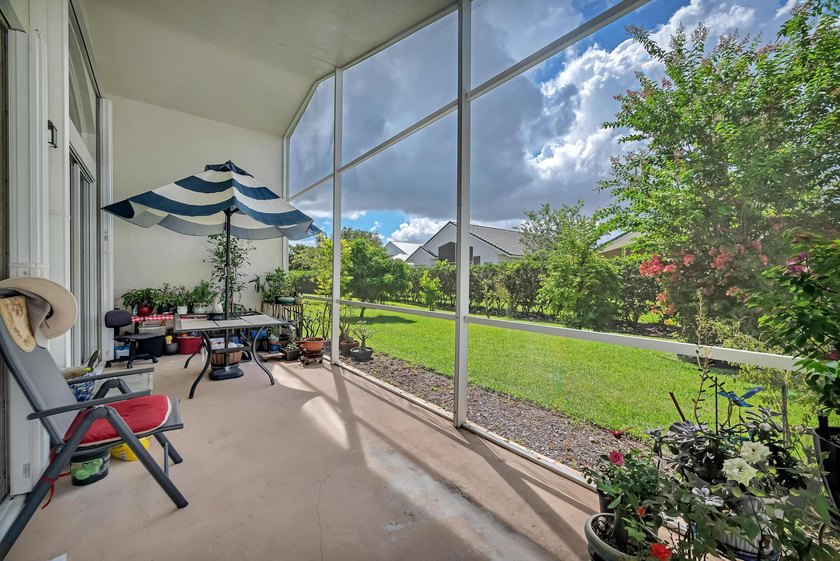 Nestled in the desirable gated community of Magnolia Lakes in - photo 18