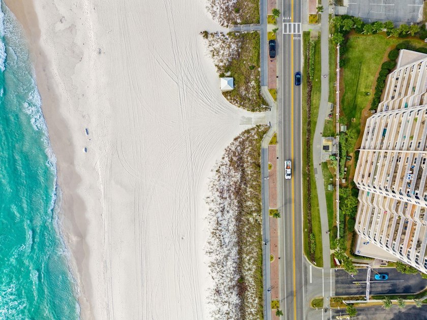 This never-rented residence offers rare dual perspectives with - photo 5