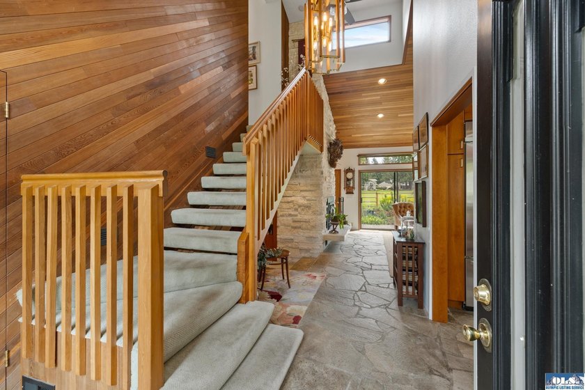 This is a home you feel the moment you enter, architecturally - photo 3