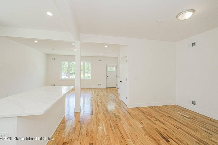 An exceptional extra large new construction 6/6 two-family semi - photo 6
