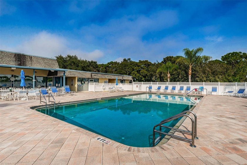 New Price! Welcome to resort-style living in the highly - photo 2