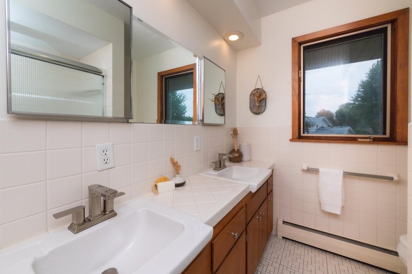 Luxury living meets midcentury charm in this stunning two-story - photo 27