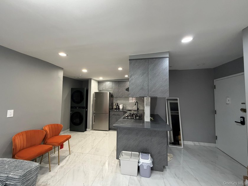 Come take a look at this renovated spacious duplex condo - photo 3