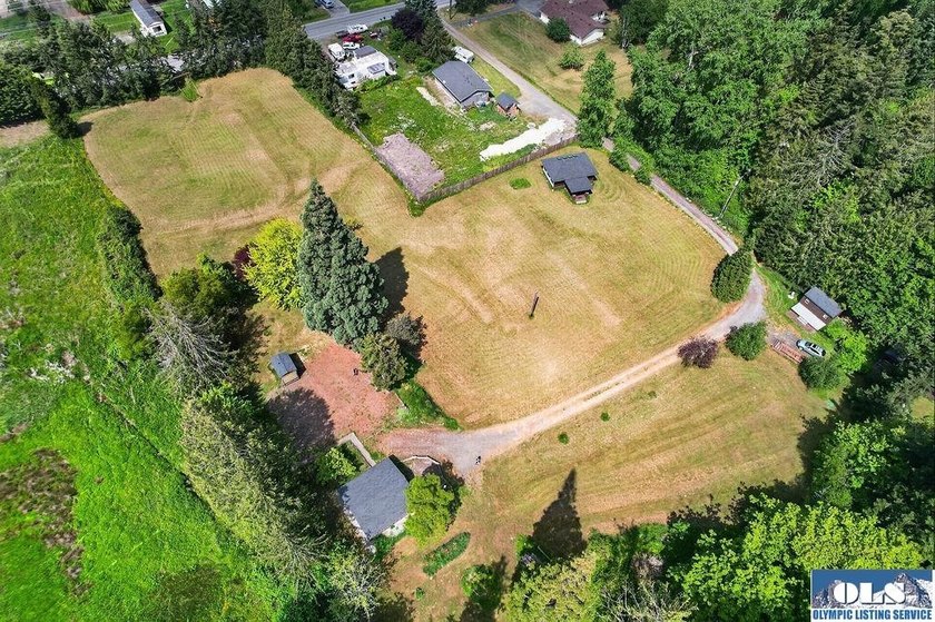 Creekside Property with Multiple Utilities &amp; Improvements. Rare - photo 2