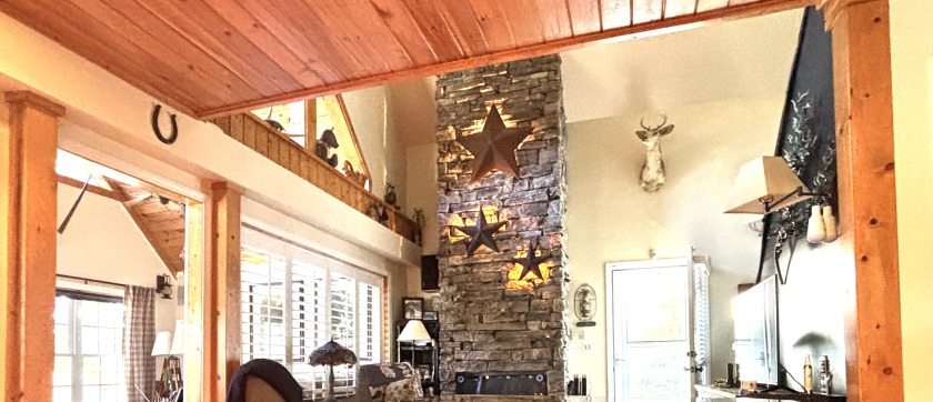 Gorgeous Ceiling to Floor Stacked Stone Wood Burning Fireplace with custom Lighting - photo 21