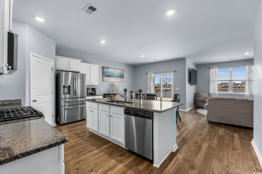 Single-level living in Village Oaks in Carolina Forest with the - photo 2