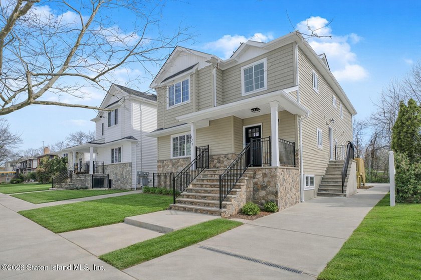 NEW CONSTRUCTION! Beautiful oversized TWO family 6/6 built with - photo 2