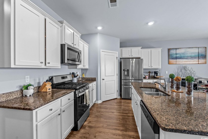 Single-level living in Village Oaks in Carolina Forest with the - photo 10