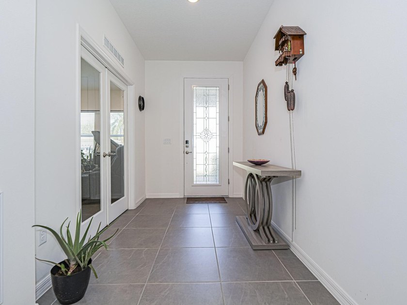 LIKE NEW beautiful 2022 built concrete block home located in the - photo 4
