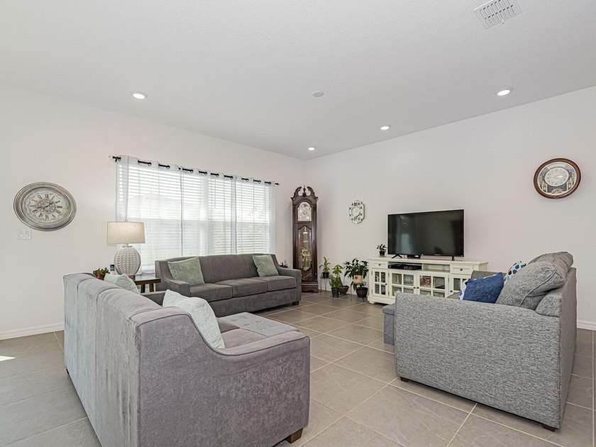 LIKE NEW beautiful 2022 built concrete block home located in the - photo 7