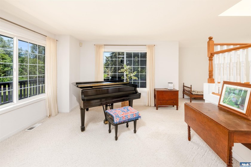 Welcome to this spacious 4-bedroom, 2.5-bath home on 5 peaceful - photo 6