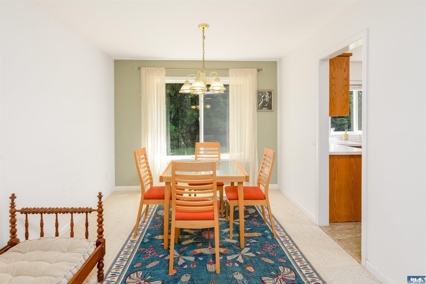 Welcome to this spacious 4-bedroom, 2.5-bath home on 5 peaceful - photo 8