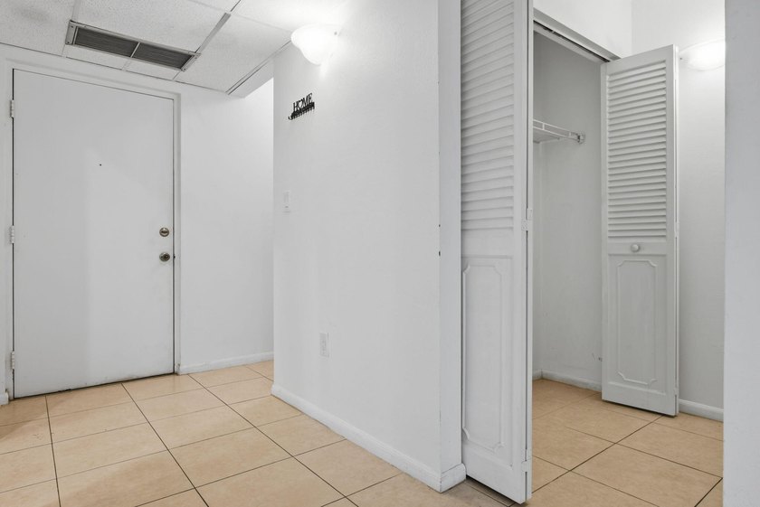 Freshly painted and exceptionally maintained, this bright and - photo 11