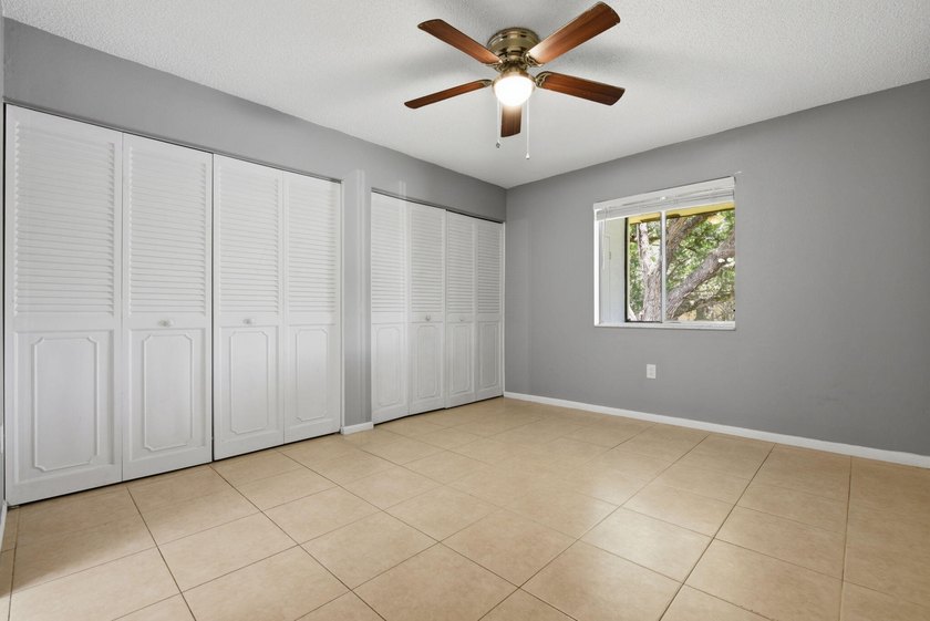 Freshly painted and exceptionally maintained, this bright and - photo 15