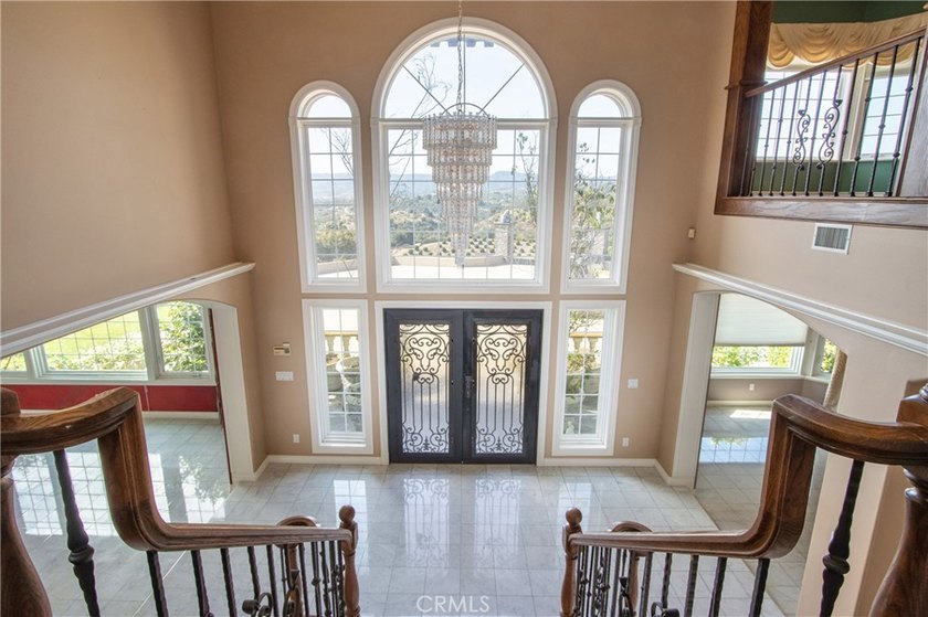 Positioned atop 20.22 fully fenced and gated acres, this stately - photo 17