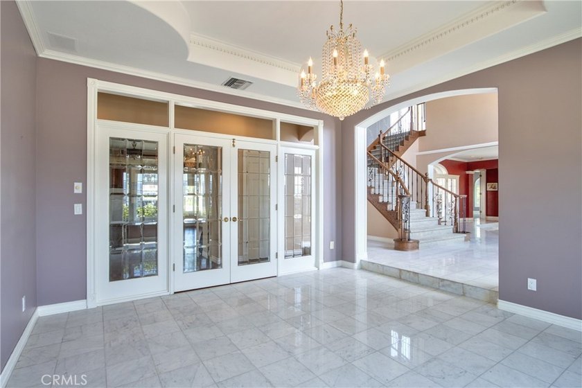 Positioned atop 20.22 fully fenced and gated acres, this stately - photo 20