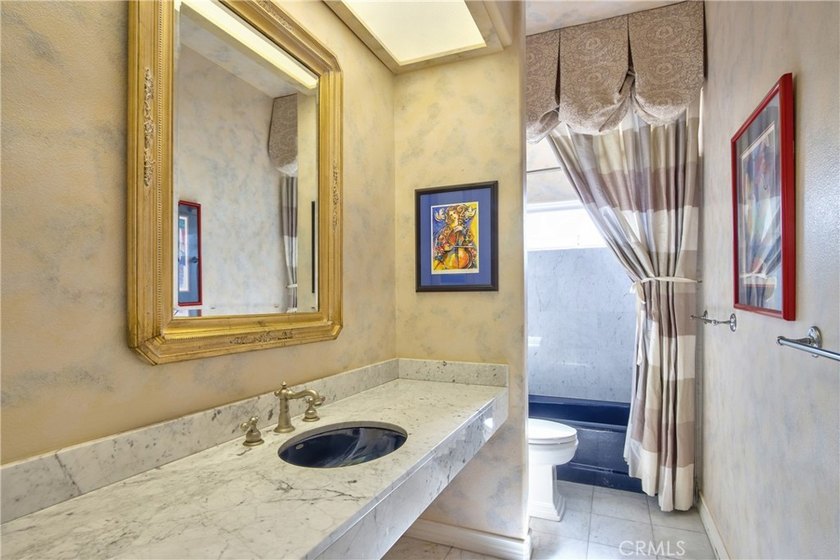Positioned atop 20.22 fully fenced and gated acres, this stately - photo 37