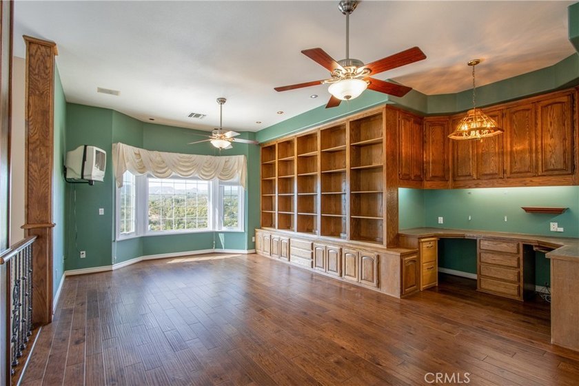 Positioned atop 20.22 fully fenced and gated acres, this stately - photo 38