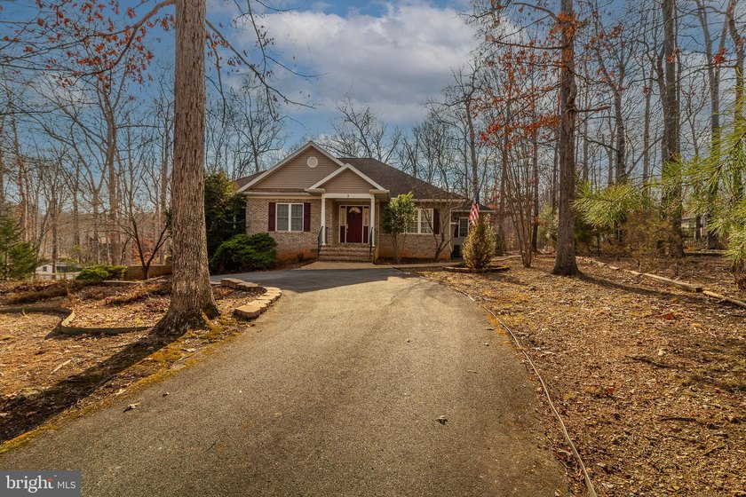 Priced almost $45,000 below Current Tax Assessment!! Come Home - photo 2