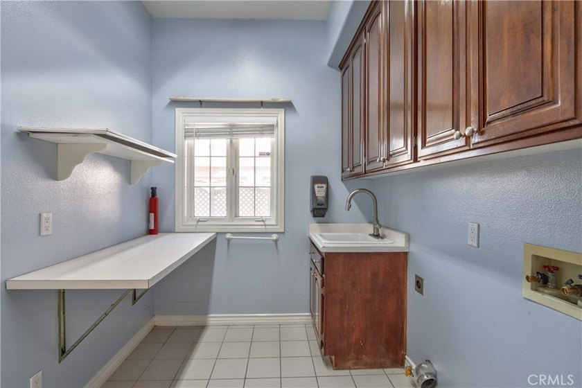 Positioned atop 20.22 fully fenced and gated acres, this stately - photo 49
