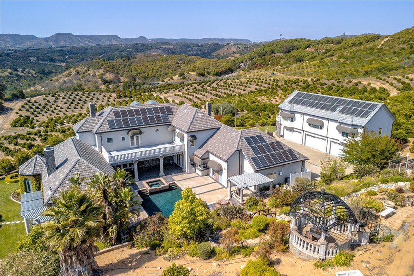 Positioned atop 20.22 fully fenced and gated acres, this stately - photo 50