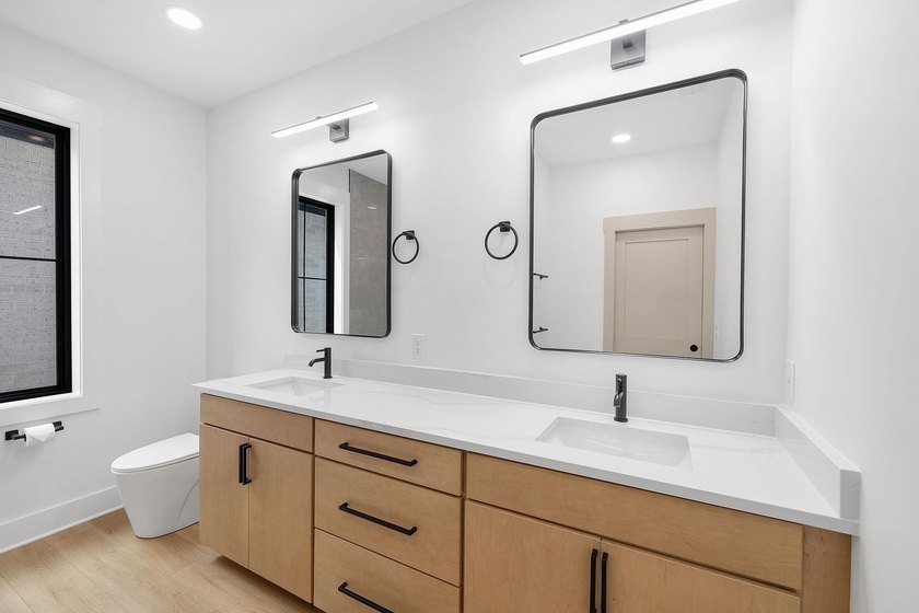 This new construction modern lake home is so fresh the walls - photo 11