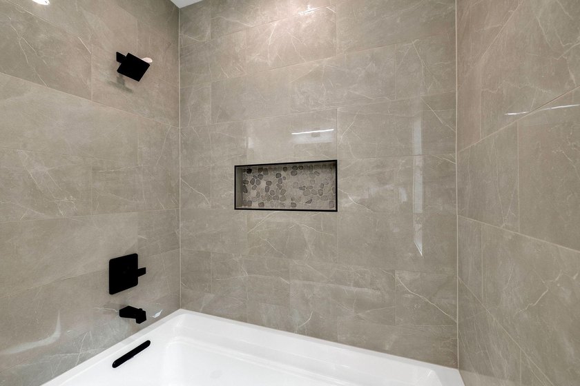 This new construction modern lake home is so fresh the walls - photo 12
