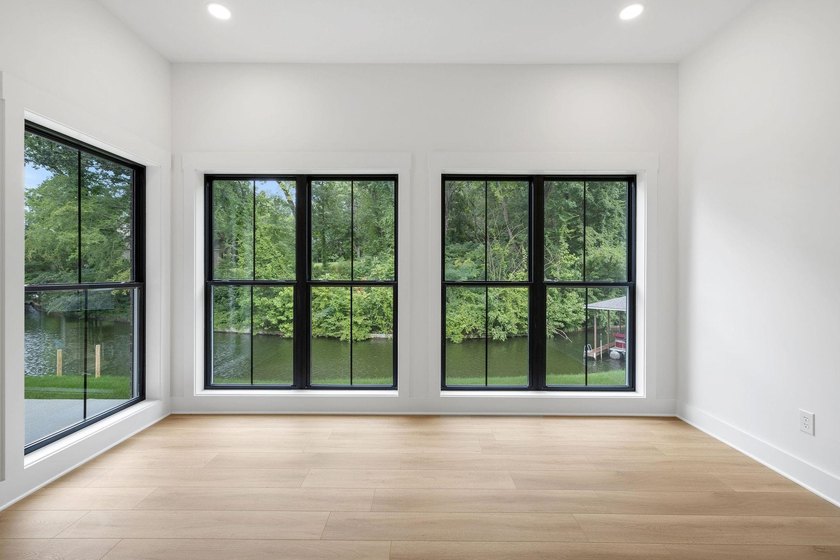 This new construction modern lake home is so fresh the walls - photo 15