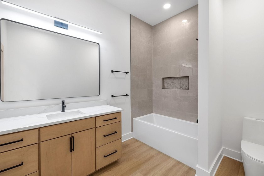 This new construction modern lake home is so fresh the walls - photo 16