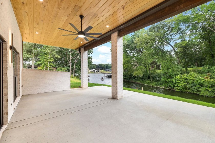This new construction modern lake home is so fresh the walls - photo 20