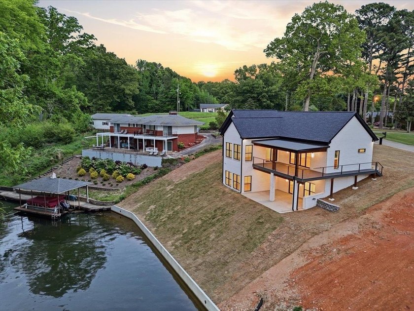 This new construction modern lake home is so fresh the walls - photo 26