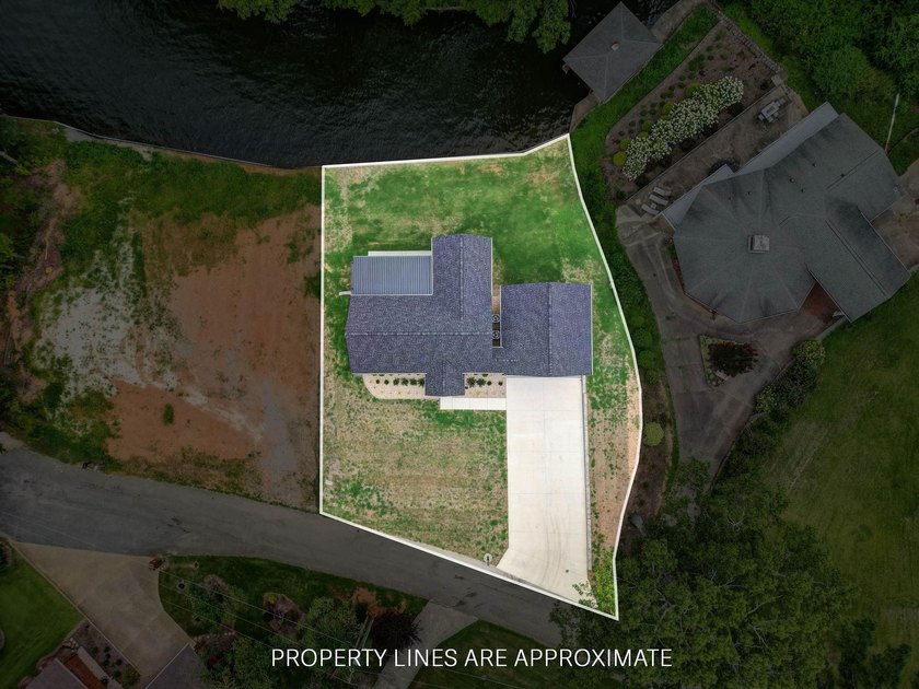 This new construction modern lake home is so fresh the walls - photo 30