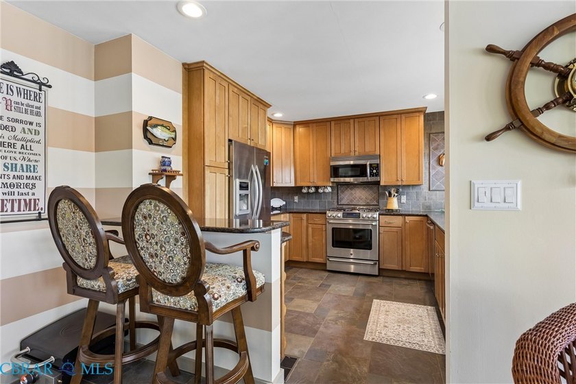 Step into this beautifully updated condo just in time for summer - photo 7