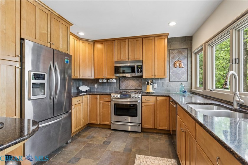 Step into this beautifully updated condo just in time for summer - photo 8