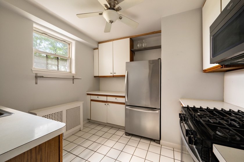 Welcome to Apartment 3F at 5800 Arlington Avenue, a bright and - photo 4