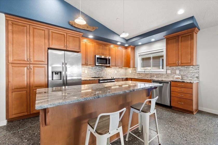 Live just steps from the ocean in the thoughtfully built - photo 15