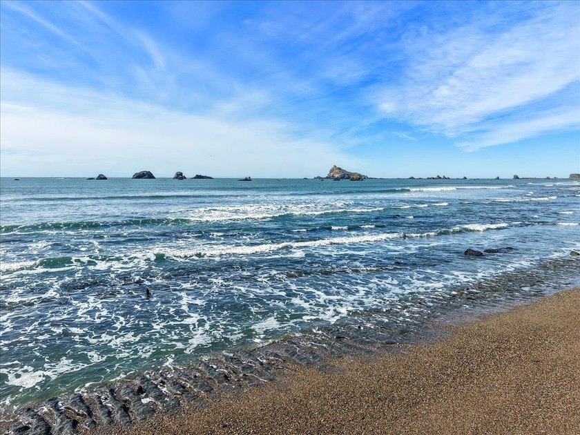 Live just steps from the ocean in the thoughtfully built - photo 33