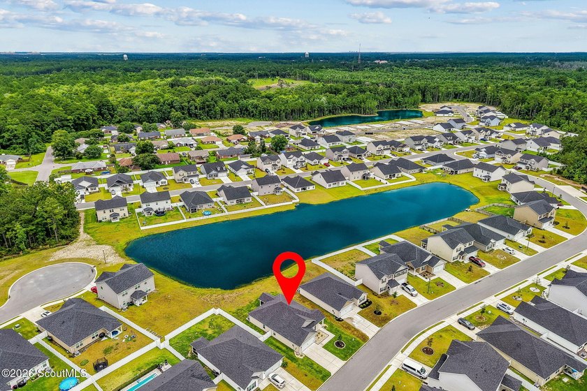 Built in 2023, beautifully maintained, and serving up pond views - photo 4